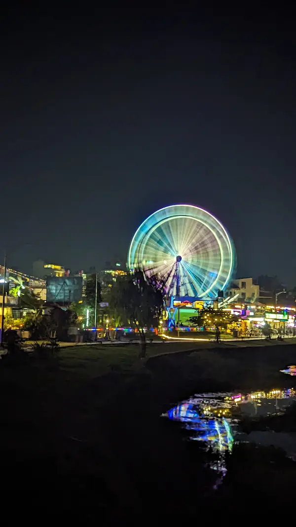 Neon Ferris Wheel at Night